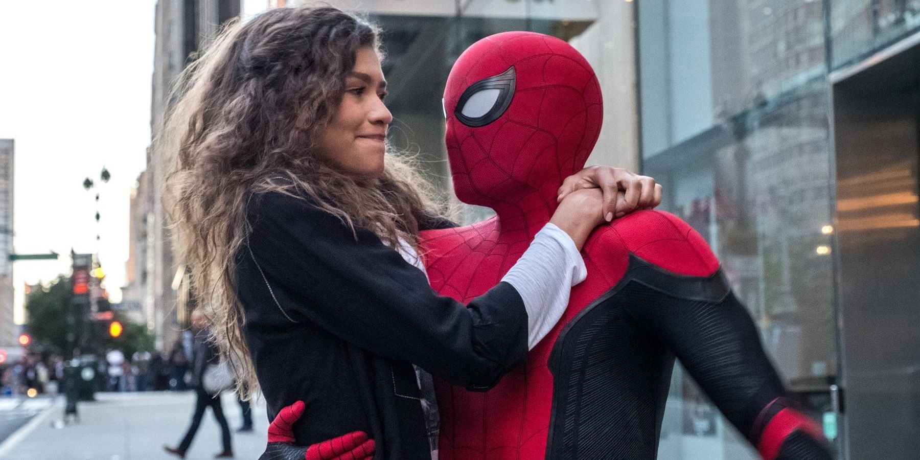 Spider-Man holding MJ in Far from Home