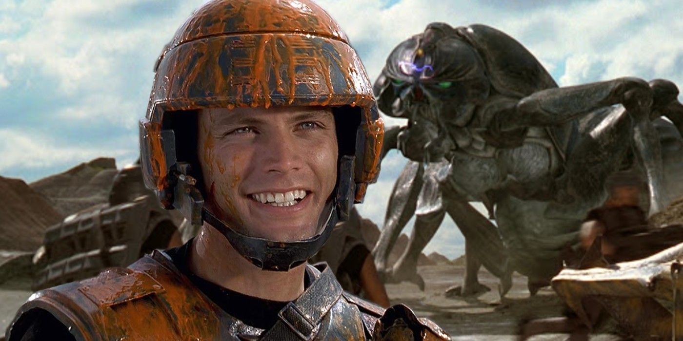 Casper Van Dien's Rico smiles beside a giant bug in Starship Troopers 