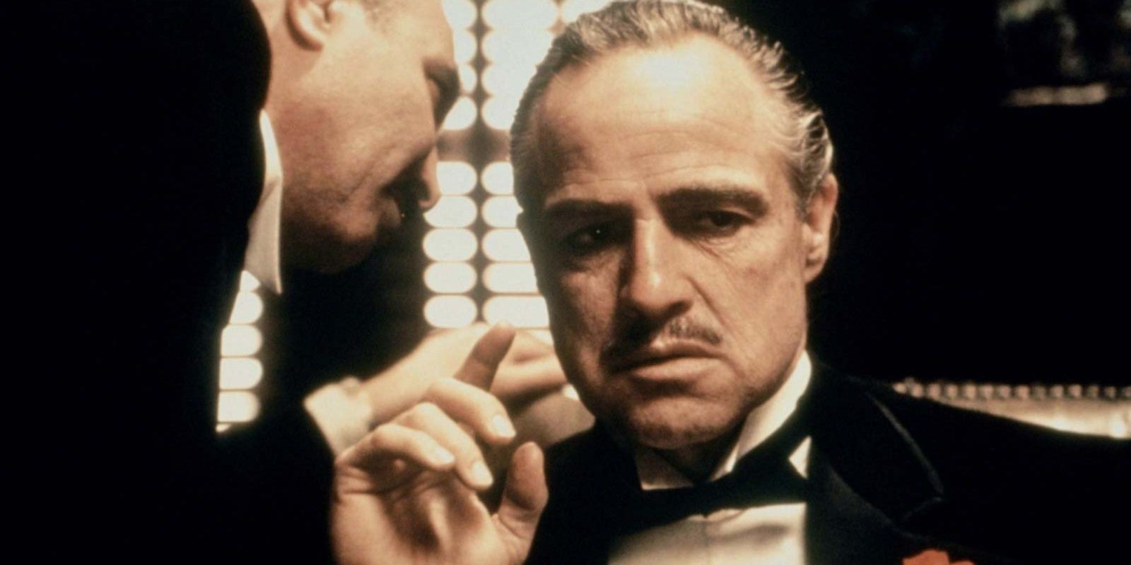 The godfather listens to his consigliere