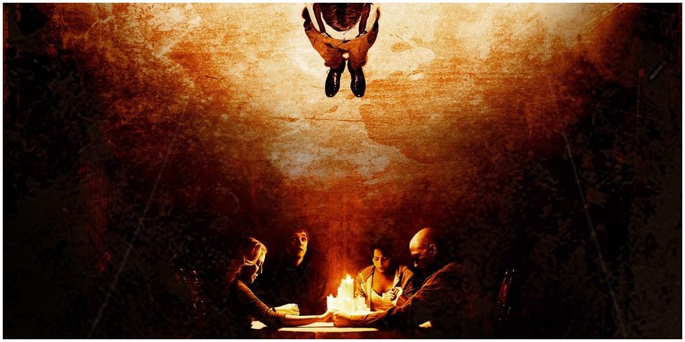 People Around Table And Boy On Ceiling