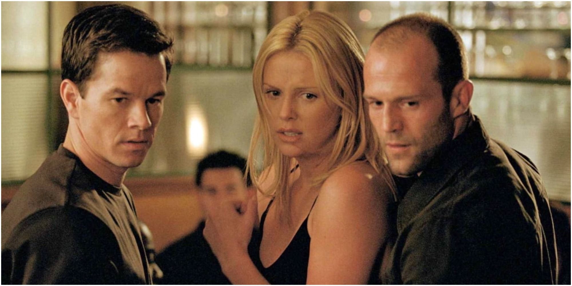 A screenshot of Mark Wahlberg, Charlize Theron and Jason Statham in The Italian Job (2003)