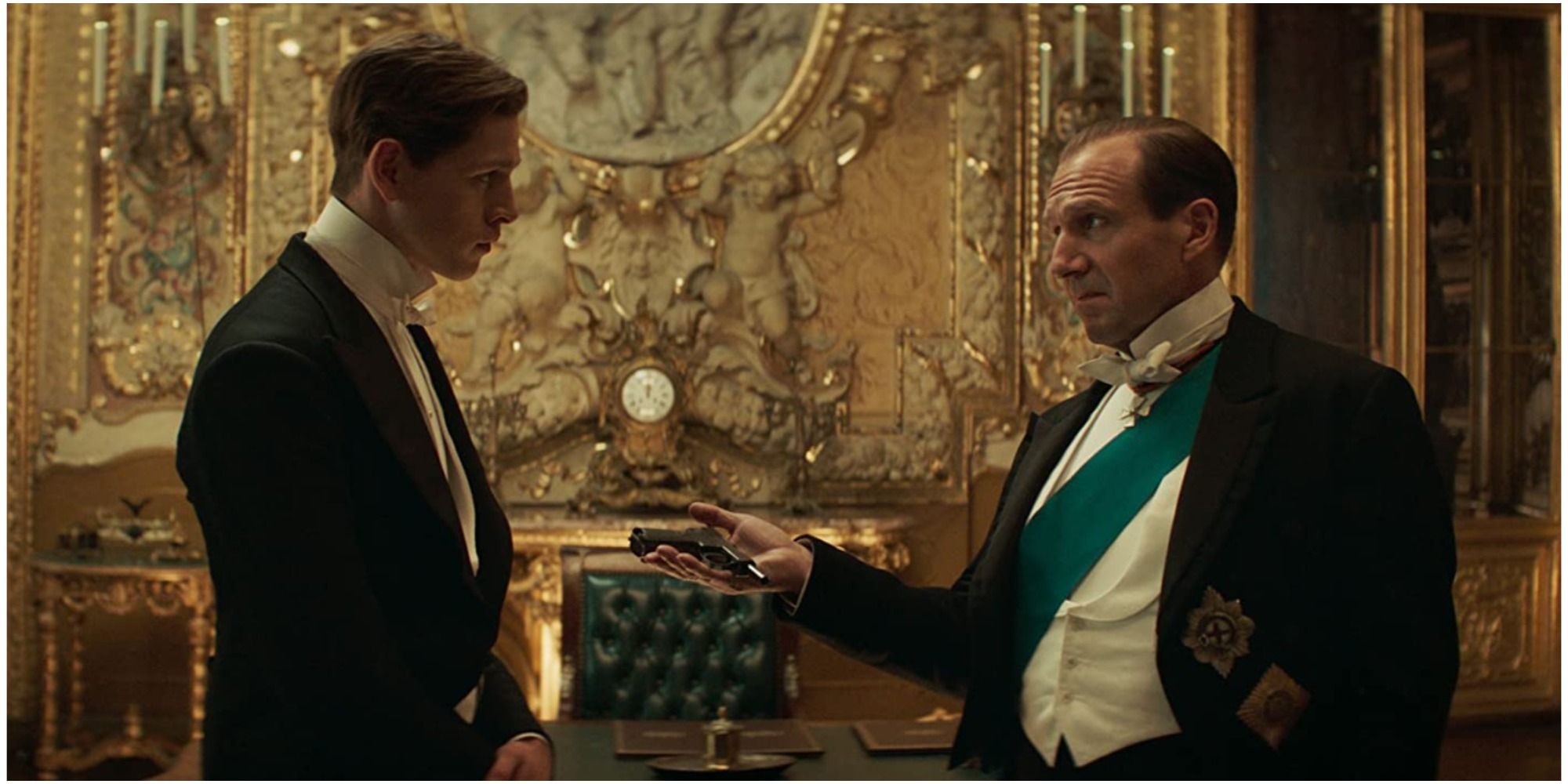 A shot of the Duke of Oxford (Ralph Fiennes) and Conrad (Harris Dickinson) in The King&rsquo;s Man