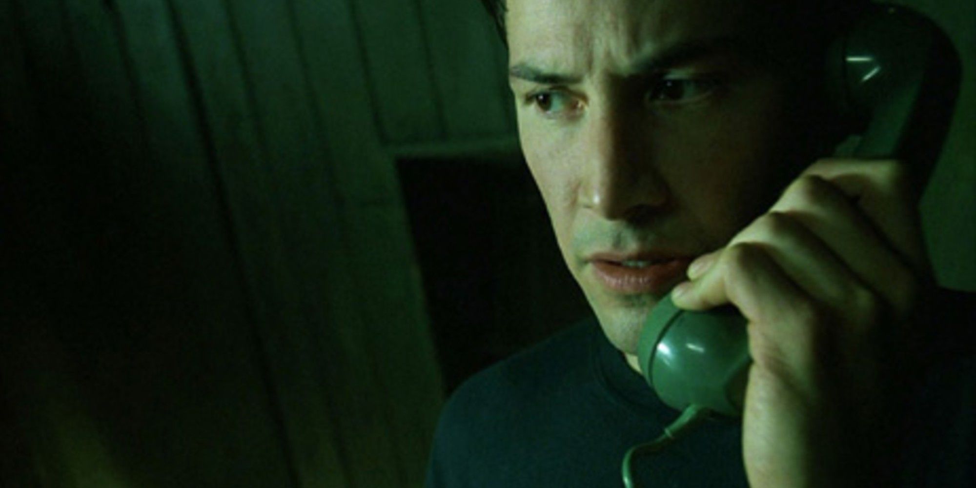 An image of Neo on the phone in The Matrix
