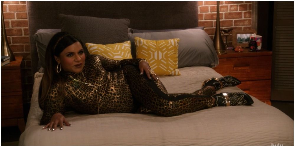 Mindy in leopard body suit