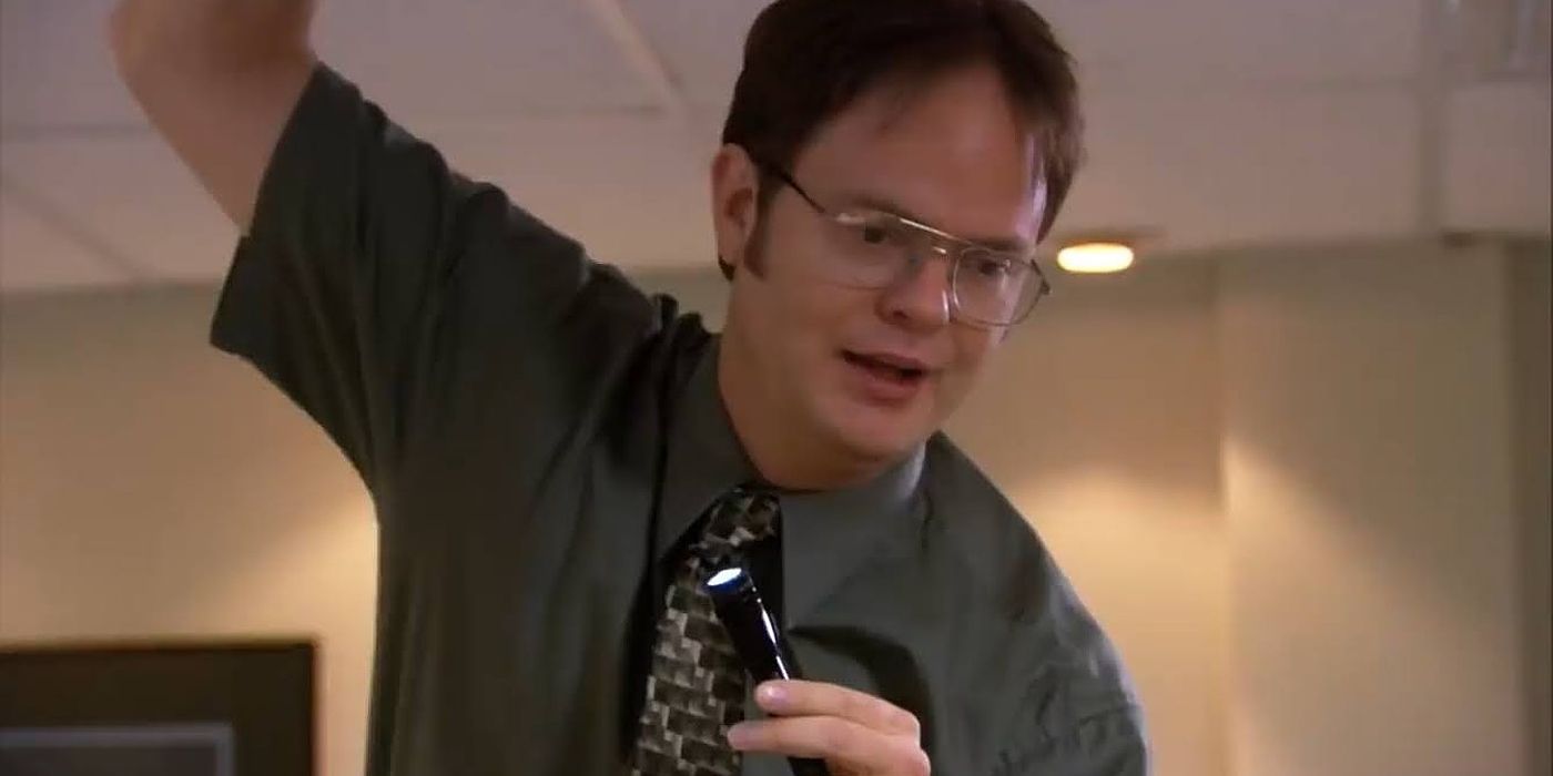 Dwight (Rainn Wilson) looks for a bat in The Office