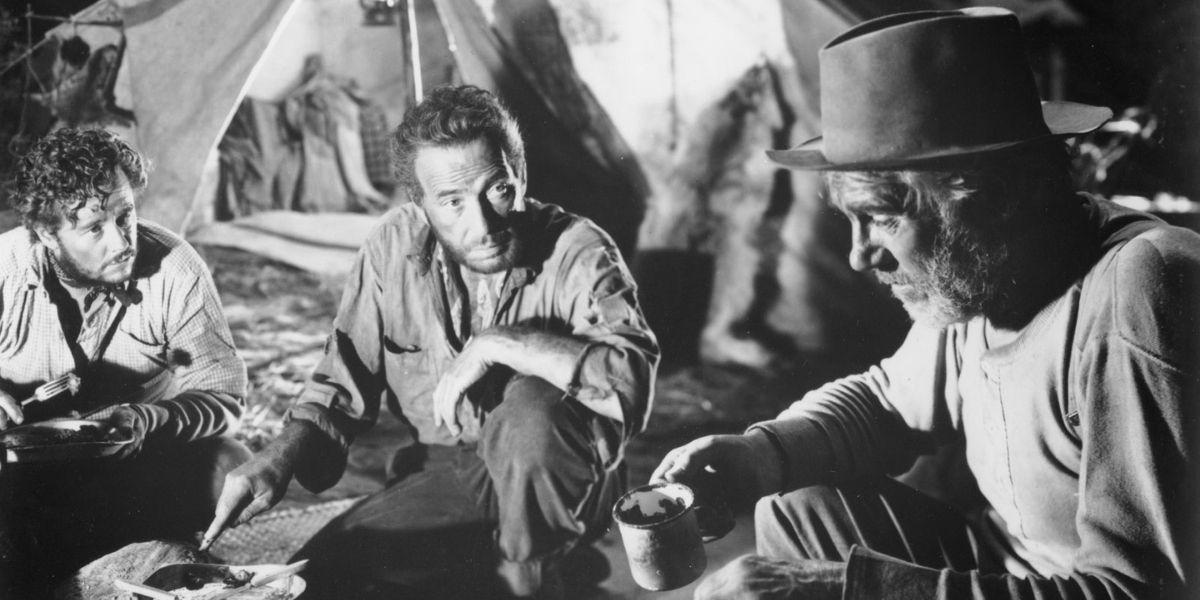 Characters outside a tent in The Treasure Of The Sierra Madre (1948)