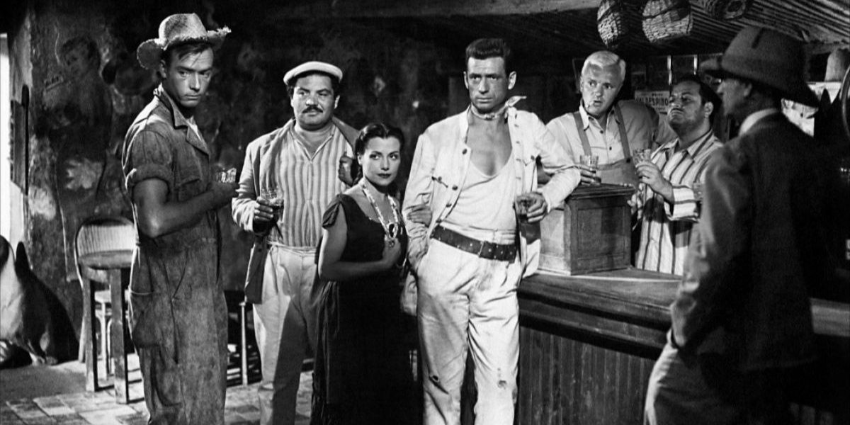 Characters from The Wages Of Fear at a bar.