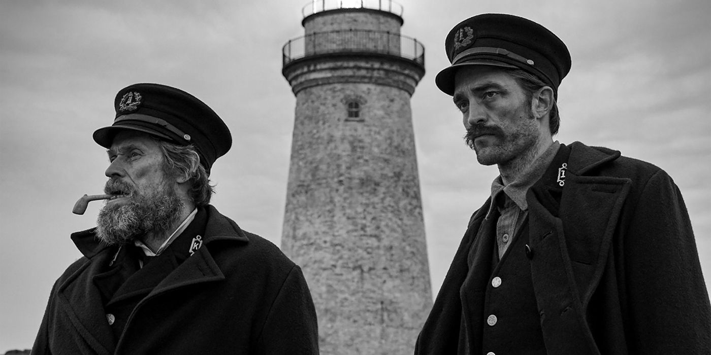 The two lighthouse keepers outdoors in The Lighthouse.