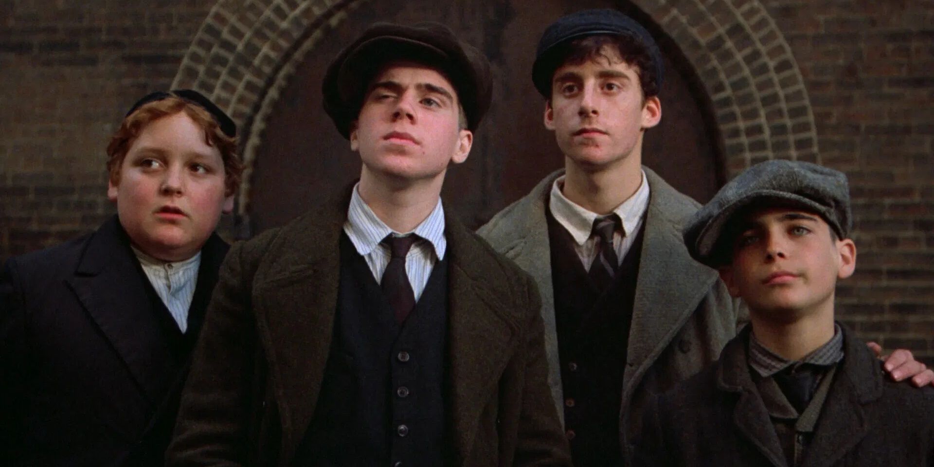 The young cast of Once Upon a Time in America standing in old style costumes