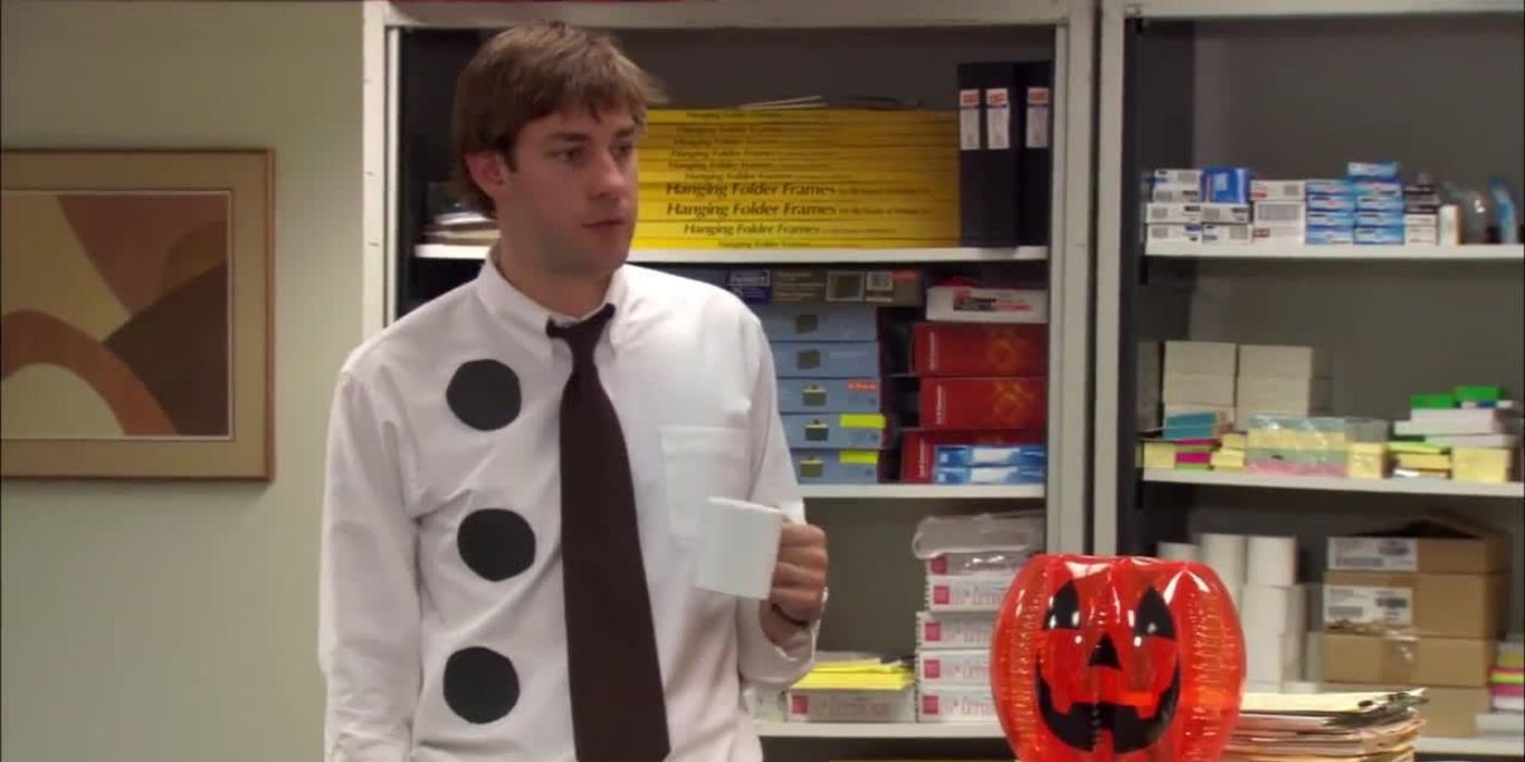 Jim from The Office wearing a shirt with three black circles that are supposed to be holes