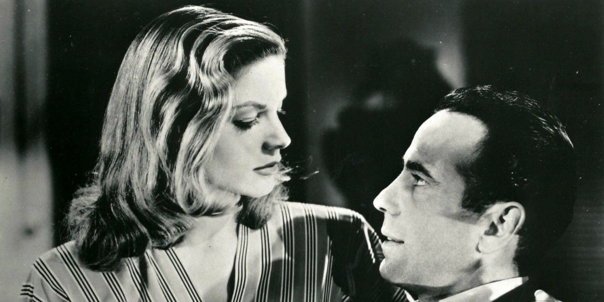 Lauren Bacall looks down at Humphrey Bogart in To Have and Have Not.