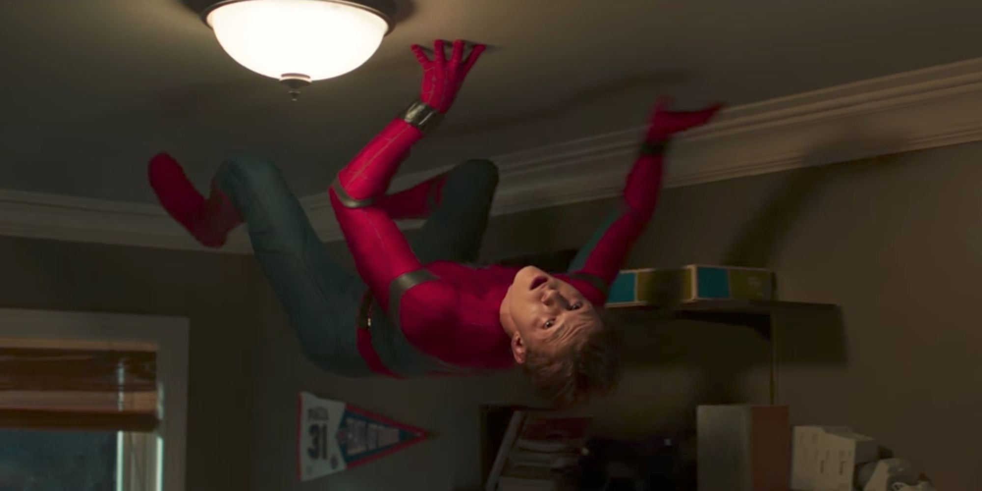 Spider-Man crawls on the ceiling in Spider-Man: Homecoming