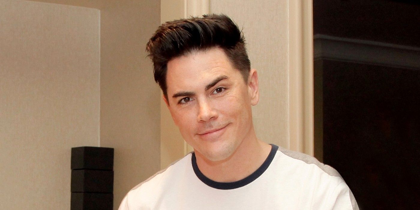 Tom Sandoval from Vanderpump Rules wearing white shirt smling