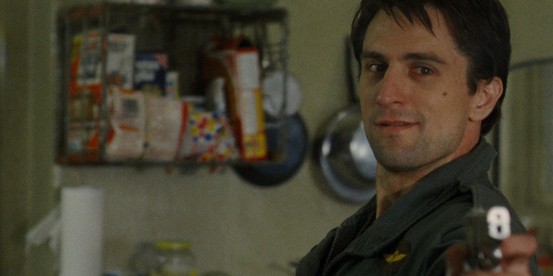 Travis talks to himself in the mirror and pointing a gun in Taxi Driver
