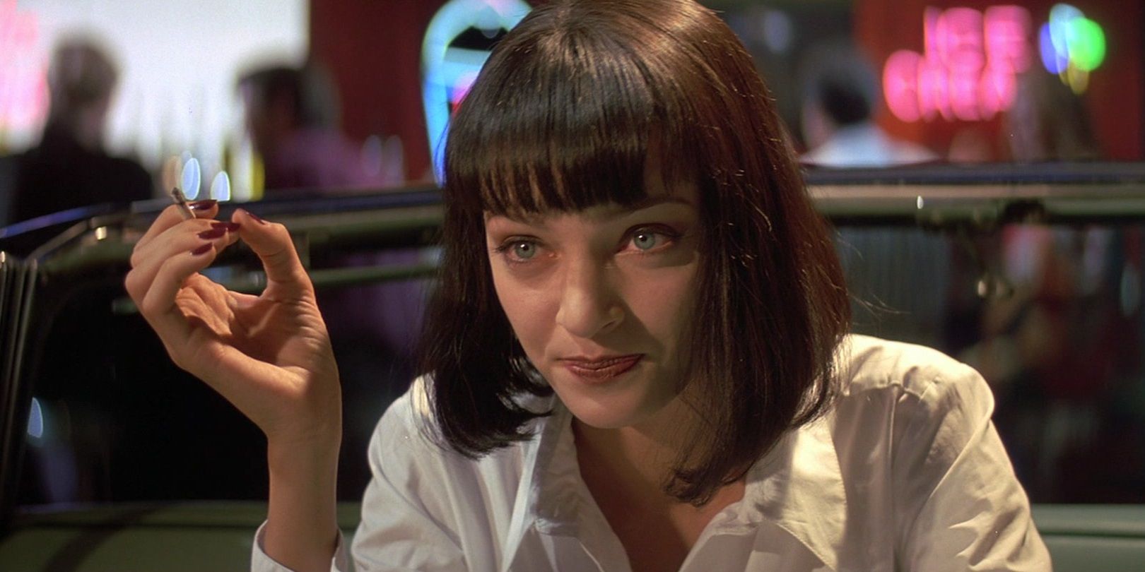 Mia Wallace talking to Vincent Vega in Pulp Fiction