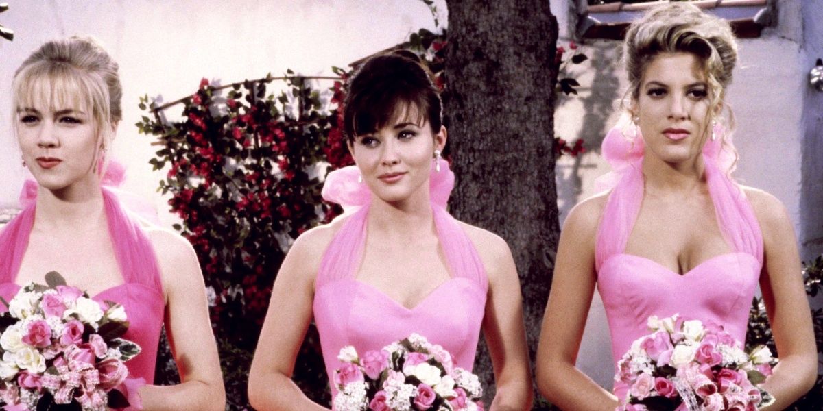 Kelly, Brenda and Donna wearing pink bridesmaid dresses in Beverly Hills 90210