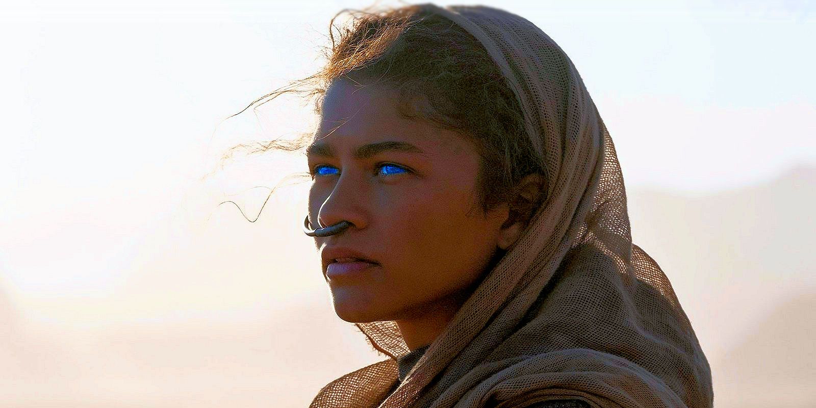 Zendaya standing in the desert in Dune