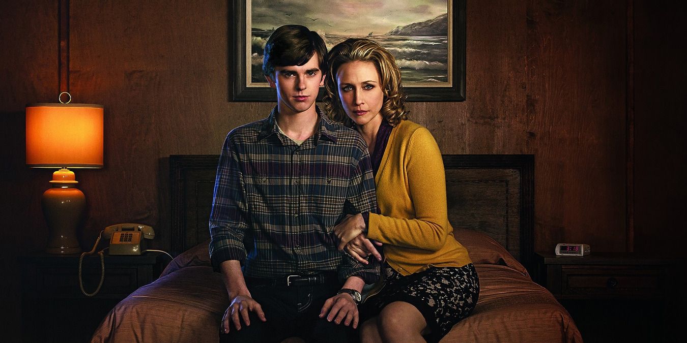 Norma and Norman bates sitting in a bed in Bates Motel