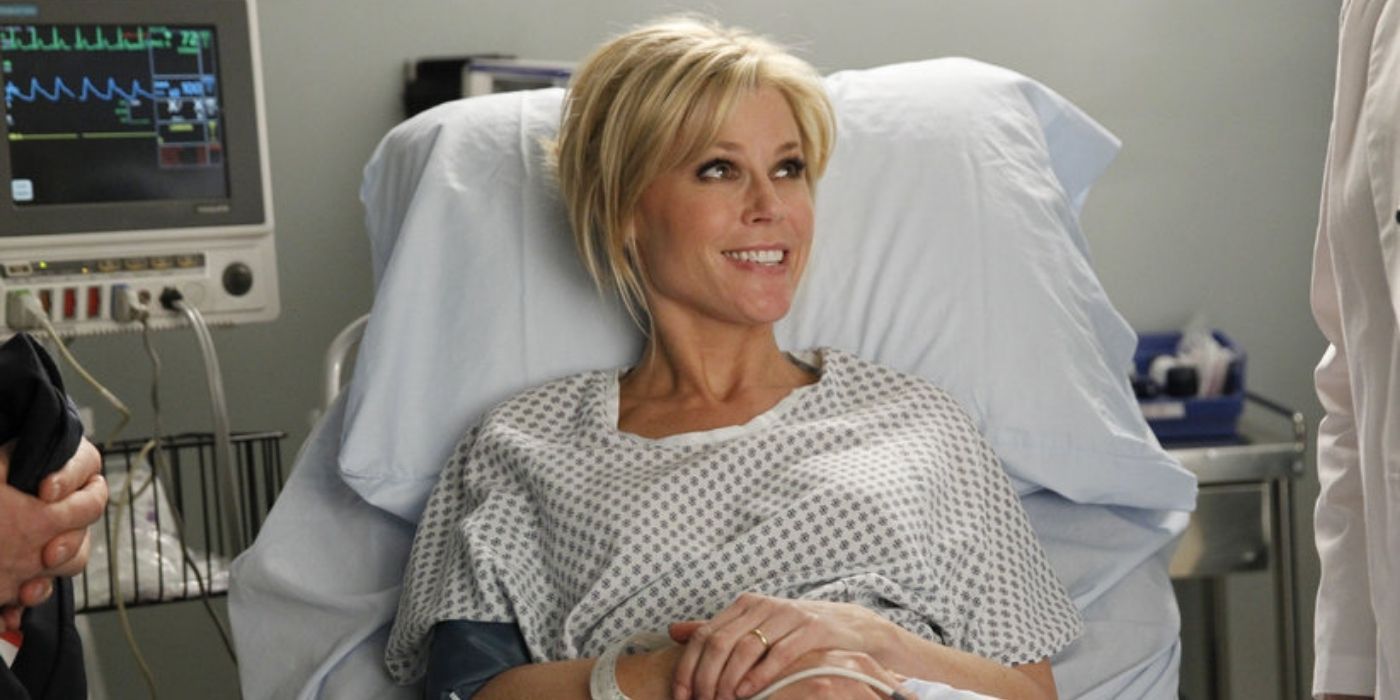 Claire smiling in a hospital bed on Modern Family