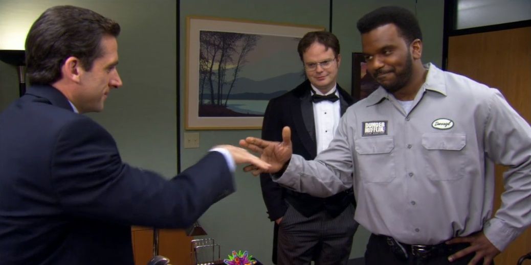 Darryl and Michael shaking hands in The Office