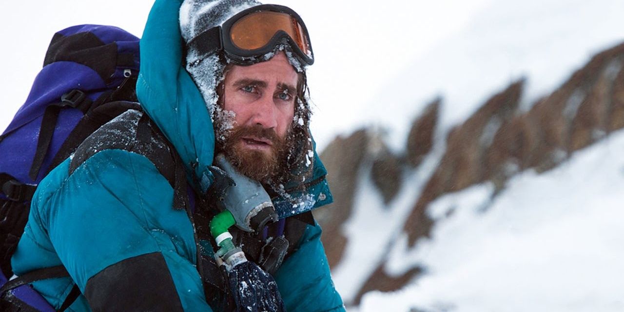 Scott Fischer kneeling at a snowy field in Everest