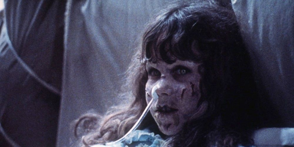 Regan hooked up to medical equipment in bed in The Exorcist