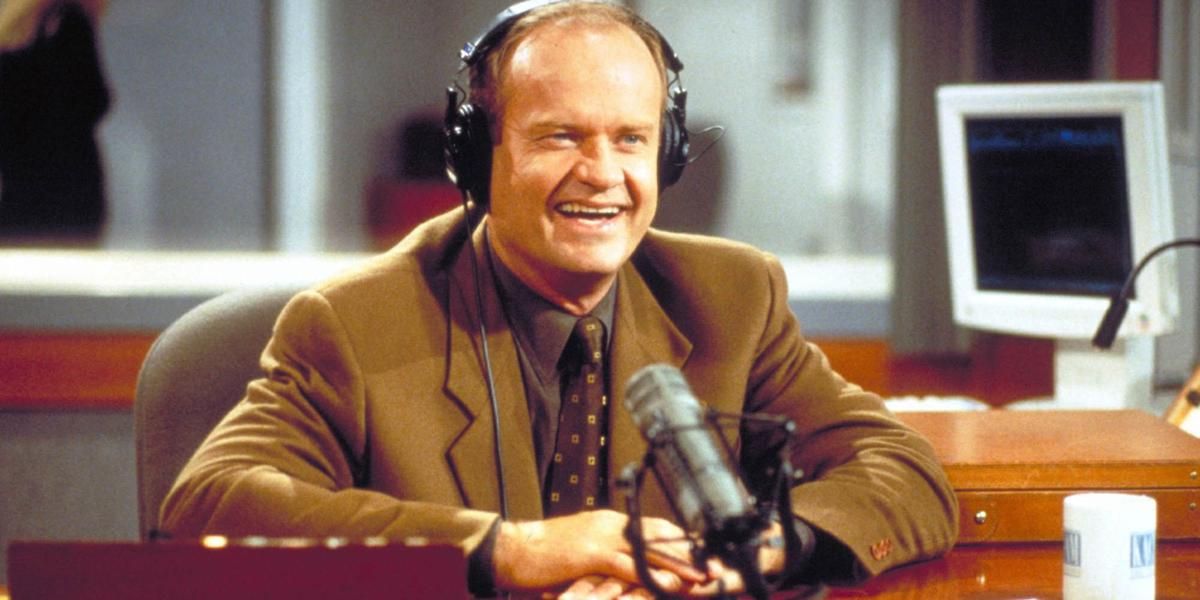 Frasier in the broadcast booth with headphones on Frasier