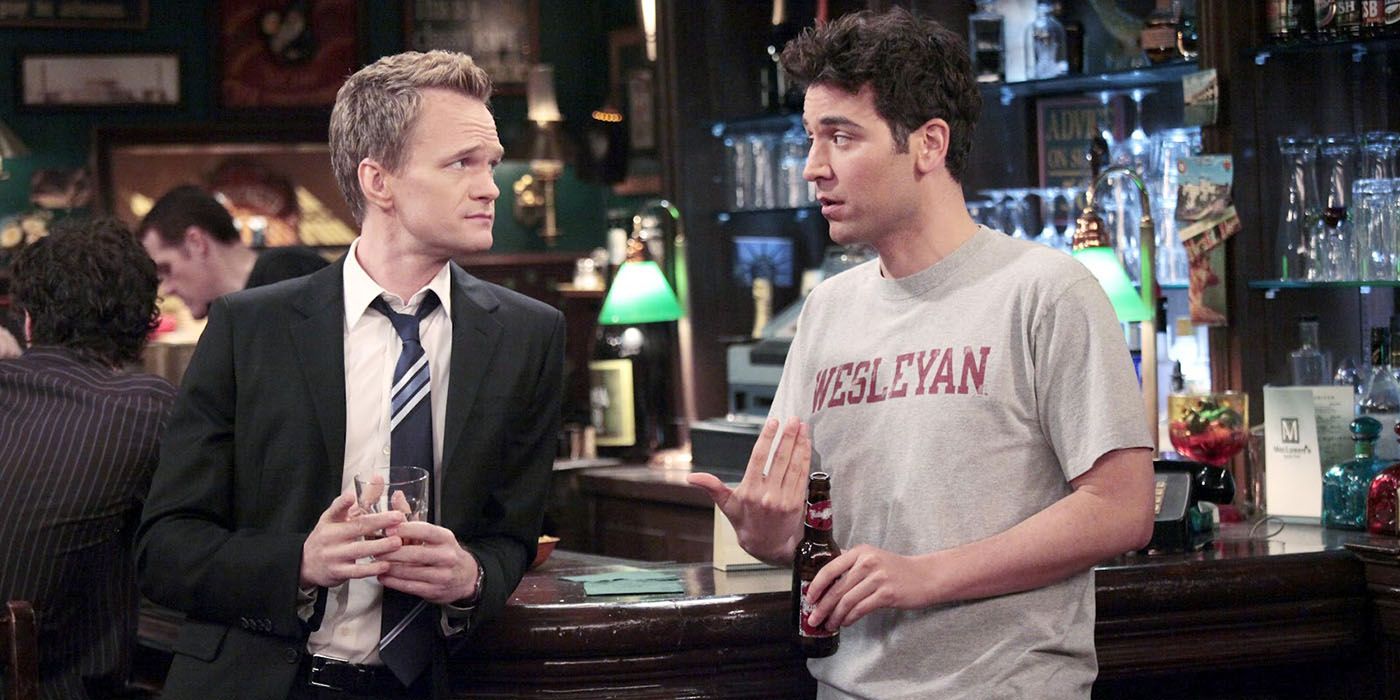 Ted and Barney talking at the bar in How I Met Your Mother.