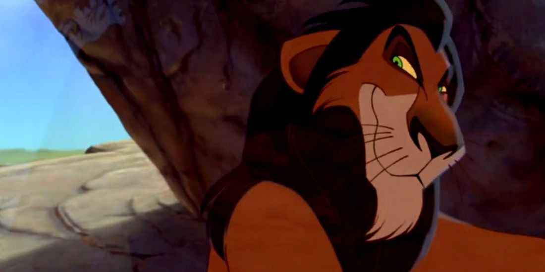 Scar looking toward the camera and smiling in The Lion King
