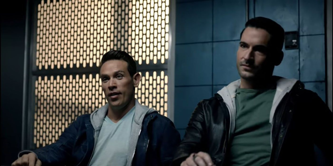 Dan and Lucifer in an interrogation room, dressed the same with a hoodie and T-shirt.