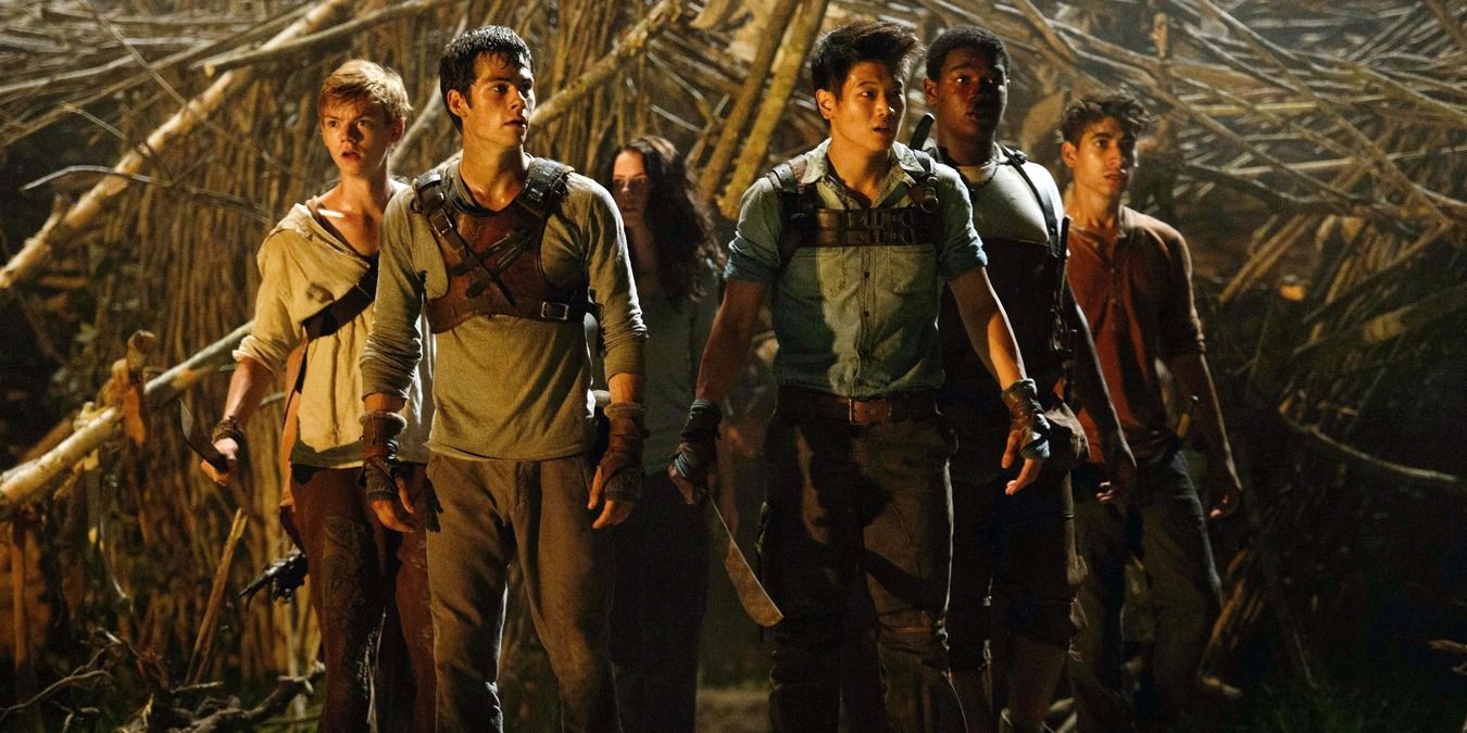 Thomas, Min-Ho, Newt, and their friends in The Maze Runner looking scared after an attack