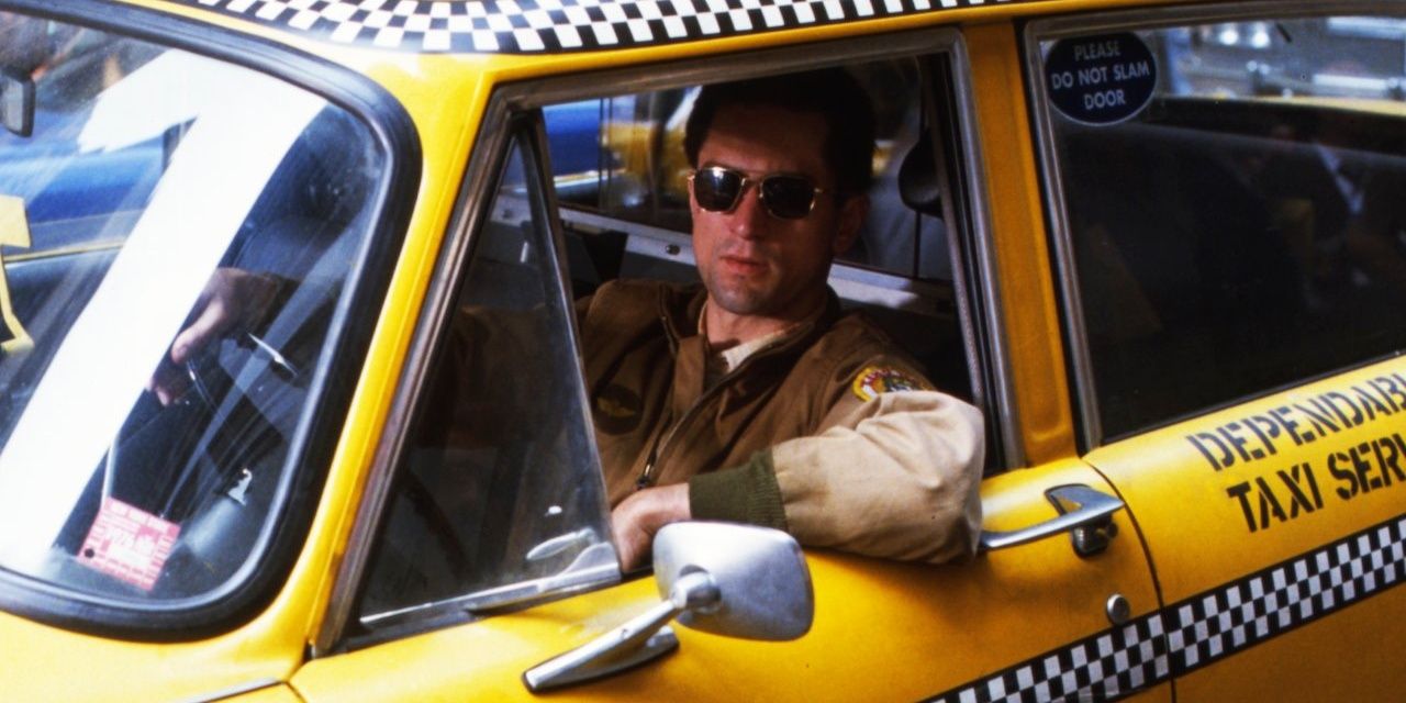 Travis Bickle sitting in his Taxi.