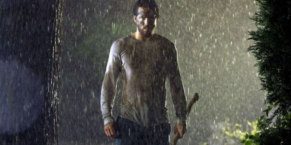 George Lutz under the rain in The Amytiville Horror