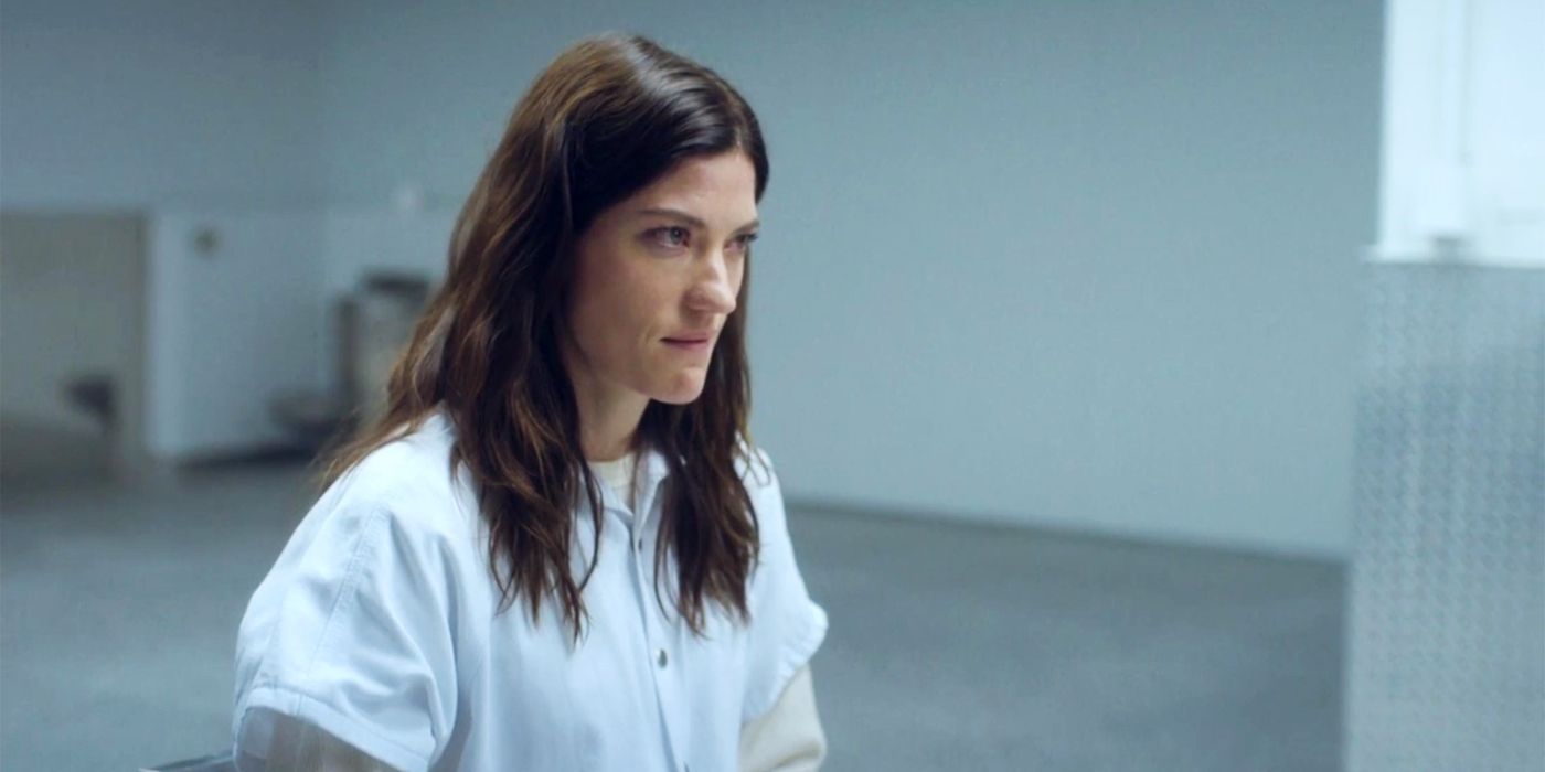 Jennifer Carpenter as Erica Shepherd wearing a white jump suit in prison in The Enemy Within.