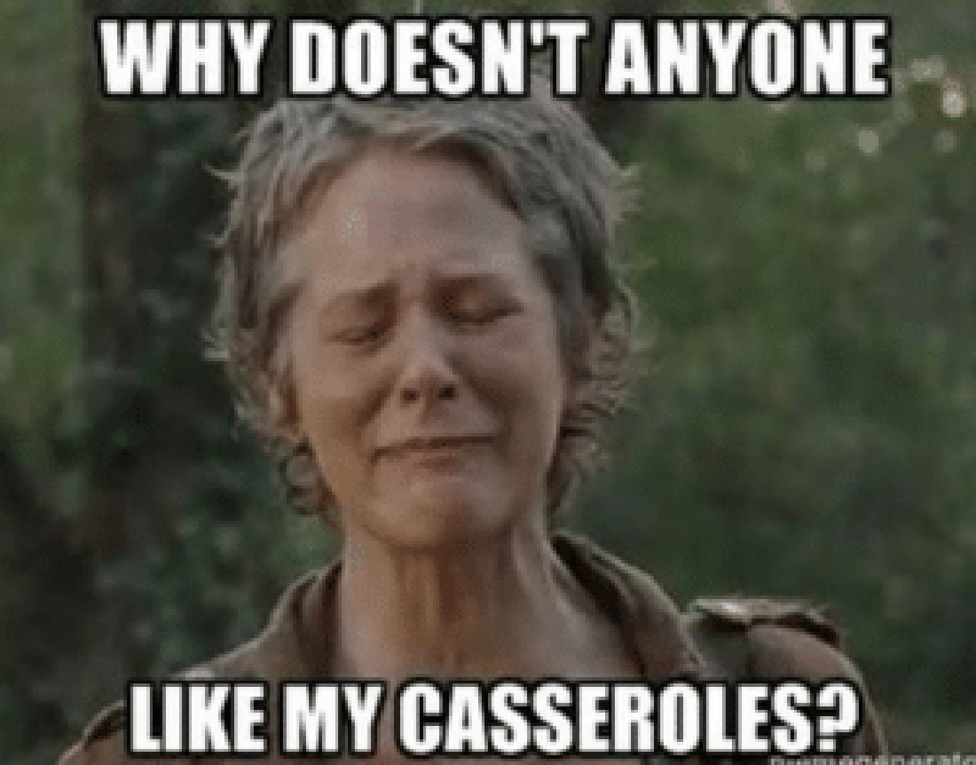 An image of Carol crying, her eyes closed.