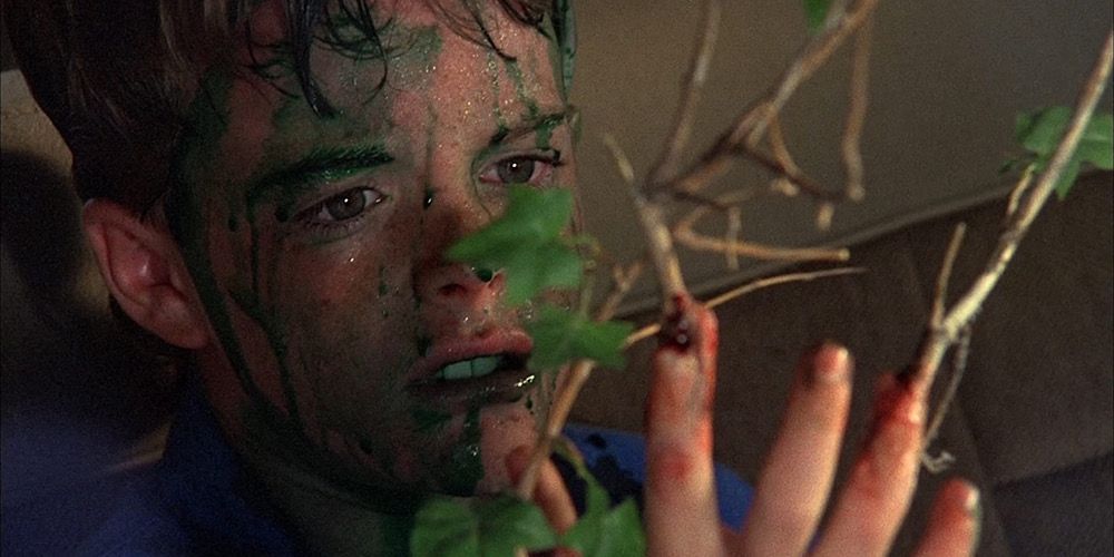 A boy is covered in green goo in Troll 2