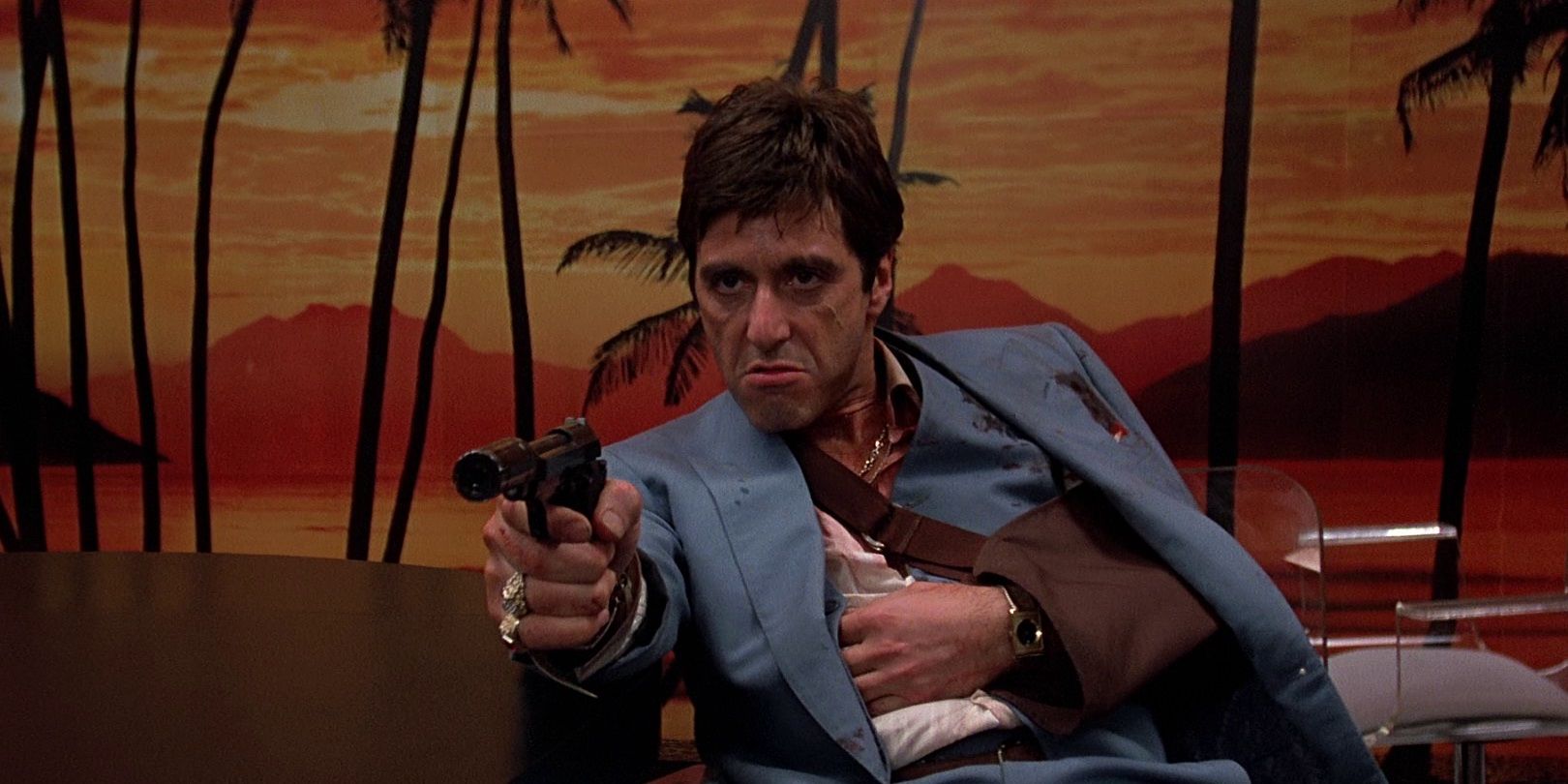 Al Pacino aiming a gun in Scarface