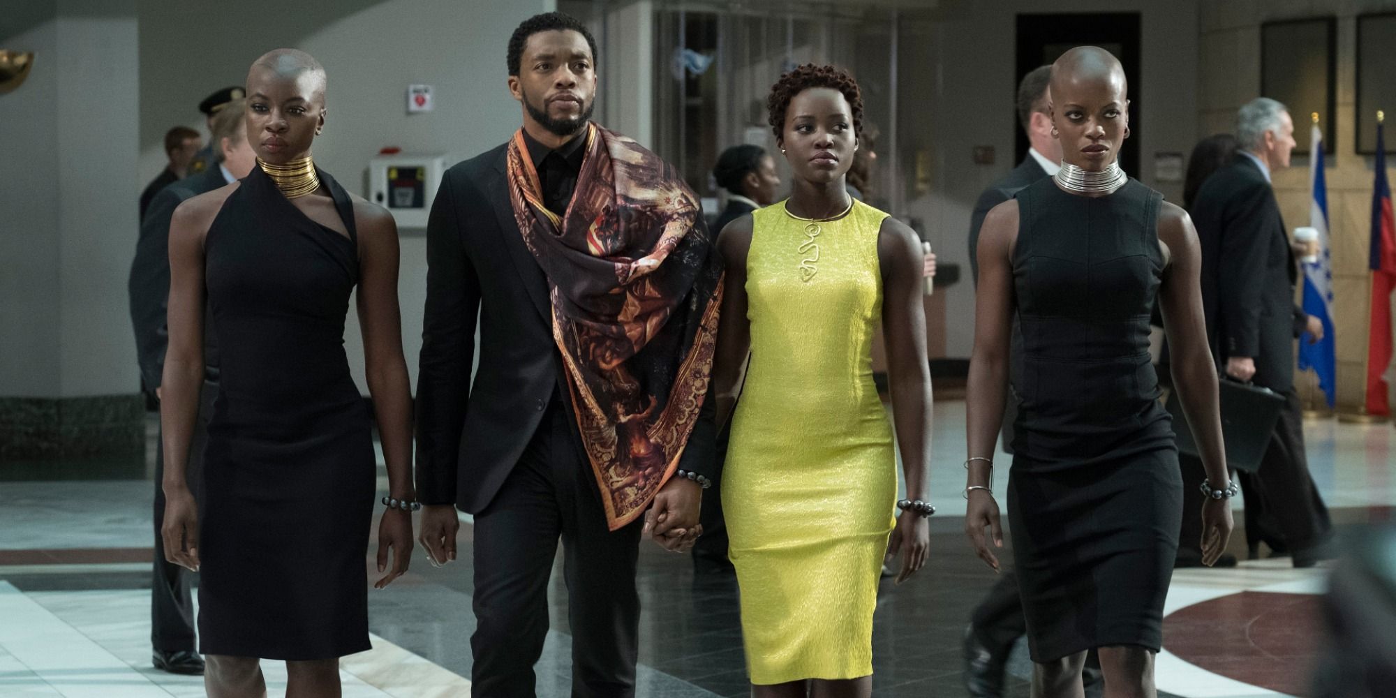 A screenshot of Chadwick Boseman's T'Challa -- along with Danai Gurira's Okoye, Lupita N'yongo's Nakia and Florence Kasumba's Ayo -- walking to a UN assembly in Black Panther