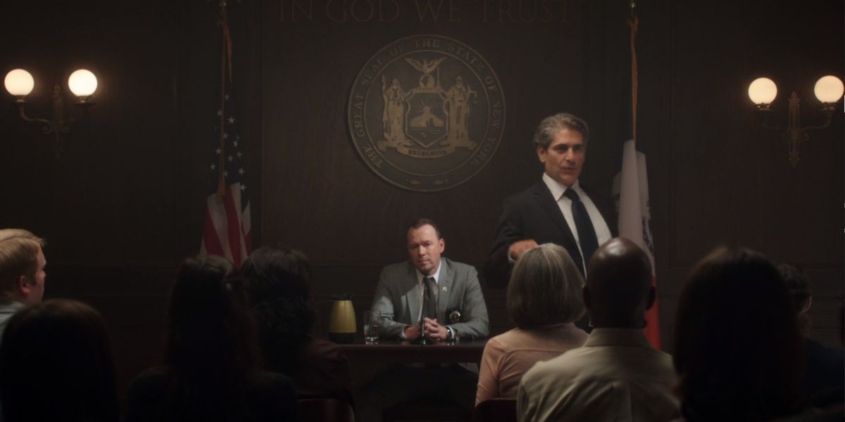 Danny in a courtroom surrounded by people in Blue Bloods