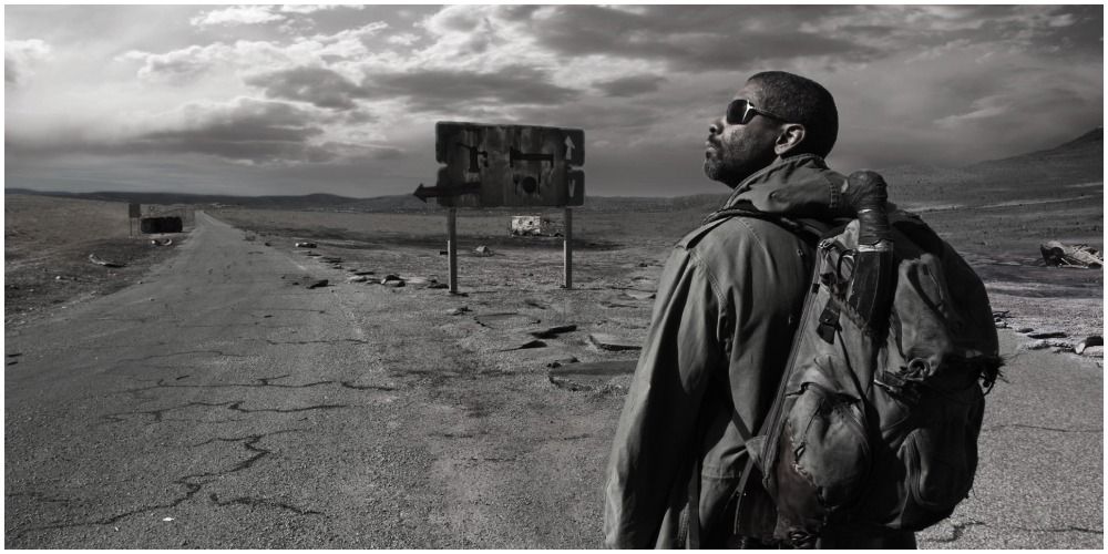 Man Walking Through Desolate Road