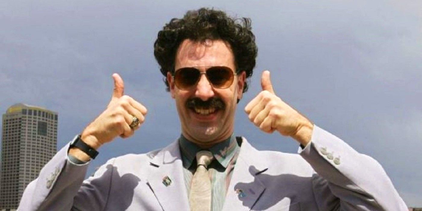 Borat with his thumbs up and sunglasses on