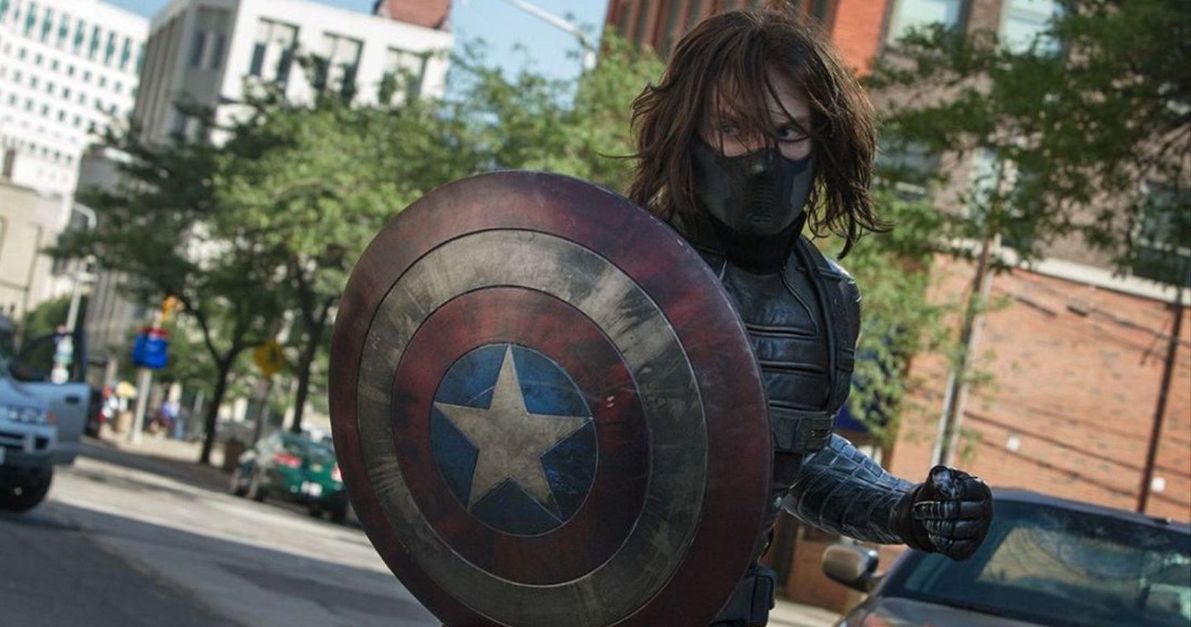 Bucky as The WInter Soldier holding Captain America's shield