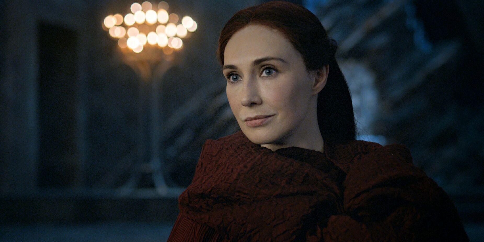 Melisandre looking seriously at someone in Game of Thrones