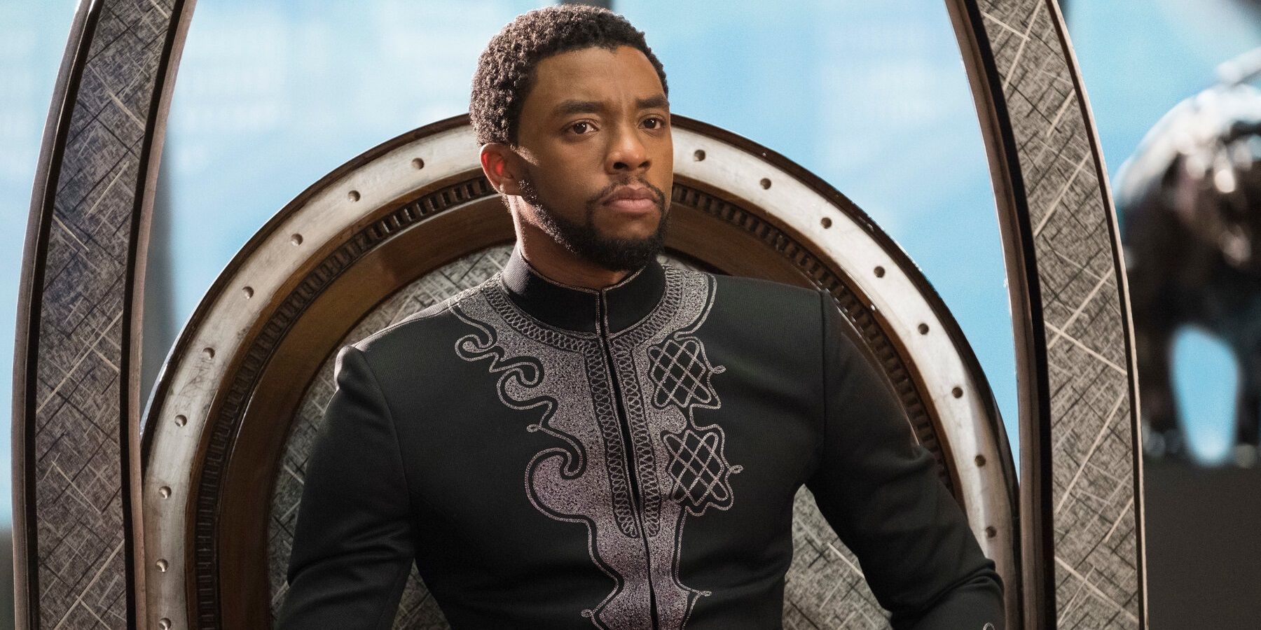 Chadwick Boseman sitting on the throne in Black Panther