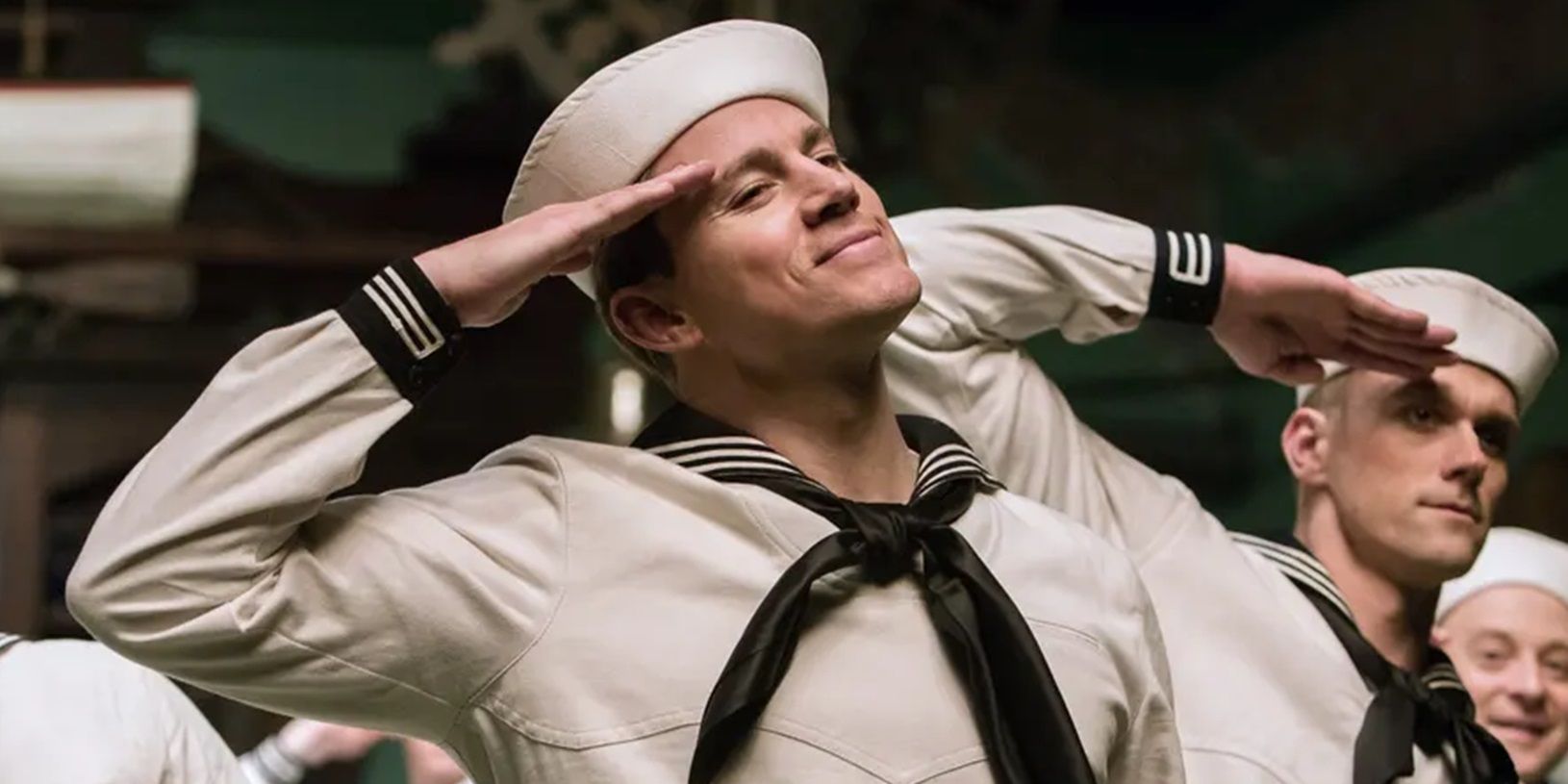 Channing Tatum wears a sailor costume and salutes in Hail Caesar