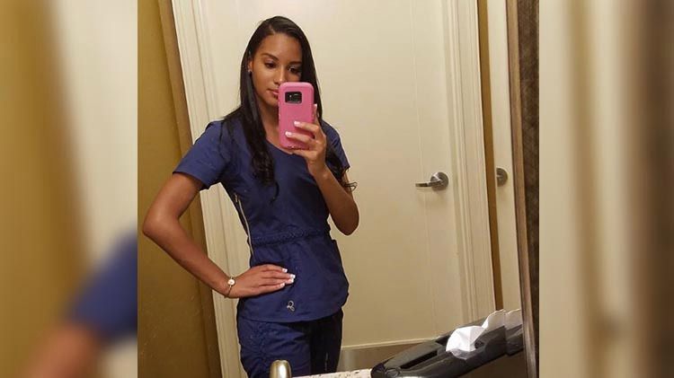 Chantel in nurse scrubs