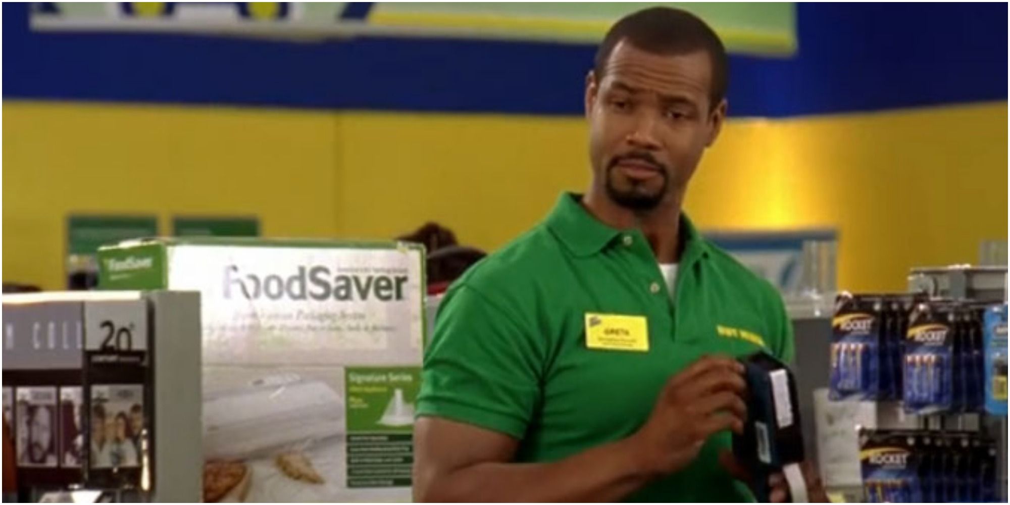 A screenshot of Isaiah Mustafa as Captain Richard Noble working undercover in Buy More as Greta in Chuck