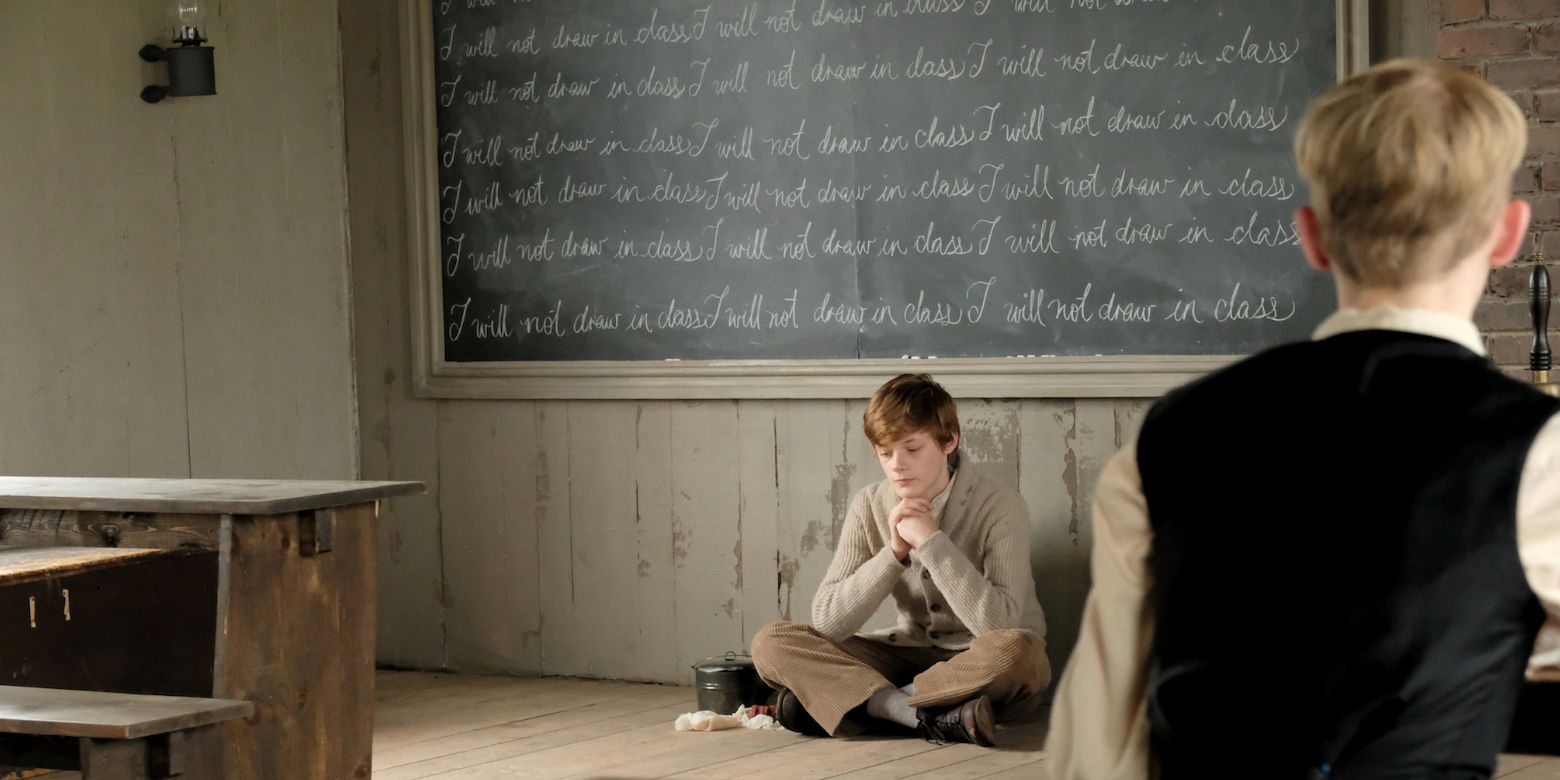Anne With An E Season 2 sees Cole sitting in front of chalkboard