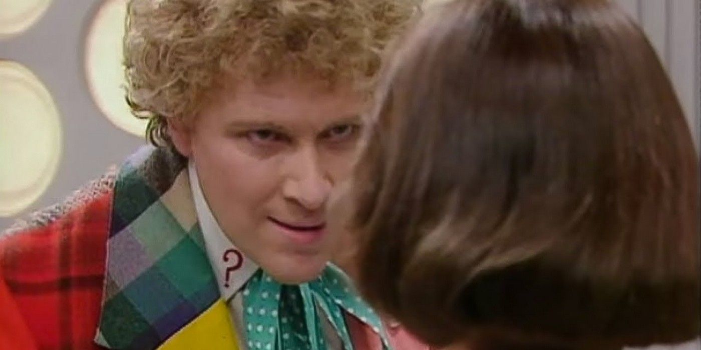 Colin Baker as Sixth Doctor in Doctor Who staring menacingly at Peri 