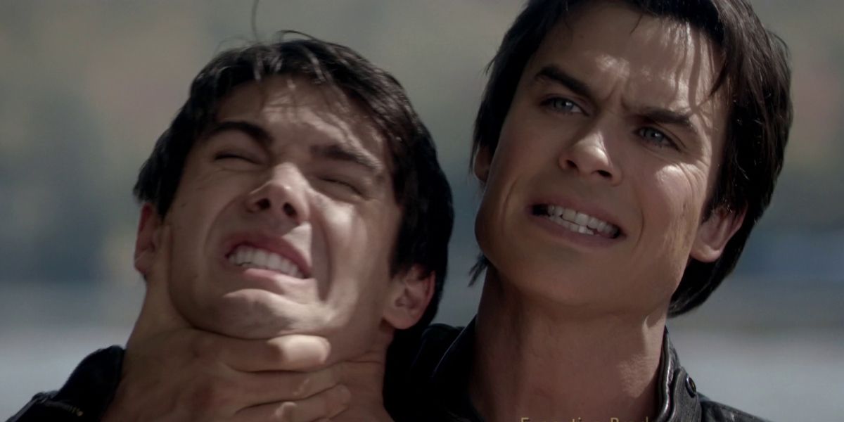 Damon grabbing Jeremy's neck on The Vampire Diaries and threatening him.